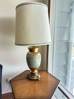 full view of lamp with shade on table