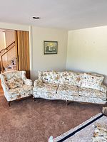 Sofa and armchair together showing size, style and upholstery