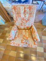Front top view of chair showing upholstery and cushion