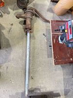 Full view of pump with long suction pipe