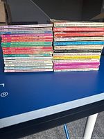 Two stacks of Betty & Veronica Double Digest comics showing spines and issue numbers