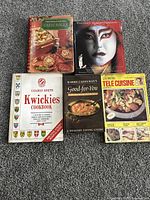 Front covers of all five cookbooks