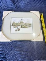 Full view of framed print with measuring tape showing height ~13 inches