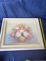 Framed oil painting front view with measuring tape showing height