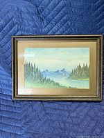 Front view of framed painting showing entire artwork, matte and frame