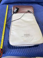 Full view of Pollenex pad with tape measure for scale