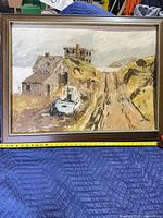 Frontal view of framed oil painting