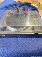 Overall view of Sony PS-11 turntable with dust cover closed