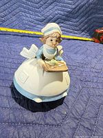 Front view of ceramic girl figurine