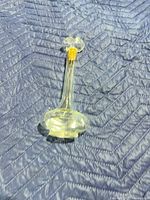 Full view of candlestick on quilted pad