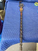 Full view of carved wooden cane