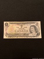 Front view of the 1973 Canadian 1-dollar banknote showing serial BFF1091954 and design elements