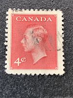 Front view of the 4-cent King George VI Canadian stamp showing design, denomination, perforations, and cancellation mark