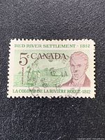 Front view of the cancelled 5-cent Canada stamp