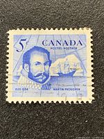 Close-up of the Canada 5¢ Martin Frobisher stamp showing design, colour, perforations and cancellation marks