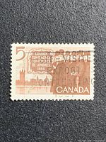 Front view of the 1966 5-cent Canadian Delegation stamp showing full design and cancellation marks