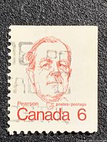 Front view of mis-perforated 6¢ Pearson stamp showing shift and tagging bar