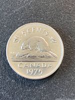 Reverse of 1975 Canada five-cent coin showing beaver design, denomination and date