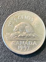 Reverse of 1997 Canada five-cent coin showing beaver design, denomination and date