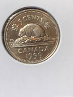 Reverse side displaying beaver, denomination and year 1999