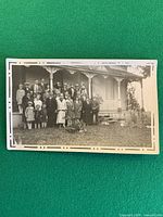 Full view of the snapshot showing group portrait and decorative border