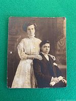 Front of mounted photograph showing couple