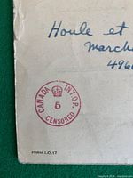 Corner of internment letter showing red crown censor stamp and Form I.O.17 notation