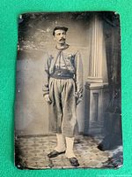 Front view of tintype showing full portrait