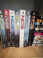 NCIS DVD season box sets lined upright
