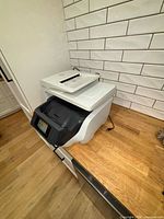 Three-quarter view of HP OfficeJet Pro 8720 on countertop