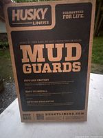 Front of original Husky Liners box showing product type and guarantee