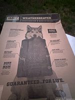Front of retail box showing Husky Liners WeatherBeater branding and product illustration