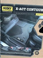 Retail box showing Husky X-Act Contour liner image