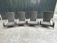 Front view of all four Patio Flare resin wicker chairs