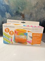 Front of boxed Baby Brezza Easy-Fill Pouch System