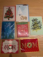 Front view of all seven cards laid out