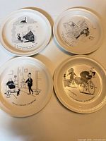 All four decorative plates front view