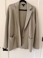 Full view of blazer front on hanger