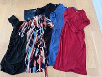All six maternity garments laid out for overview