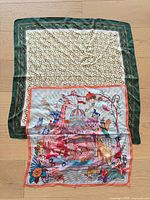 Both scarves laid out; shows designs and size relative to each other