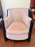 Front view showing full chair design and upholstery