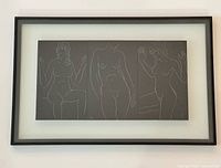 Full view of framed triptych on wall