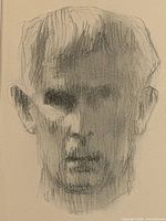 Close view of graphite portrait head on paper