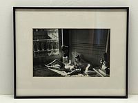 Full view of framed Helmut Newton photograph with mat and frame visible