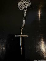 Full view of cross pendant and chain