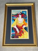Full view of framed serigraph showing artwork, mats and gold frame