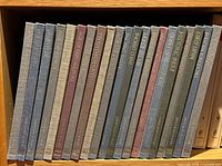 Spines of approximately 20 Great Ages of Man volumes on shelf