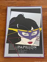 Full view of framed Patrick Nagel Papillon Gallery poster