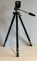 Full view of Saimic tripod standing with legs extended