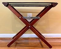 Side view of walnut folding luggage rack set up